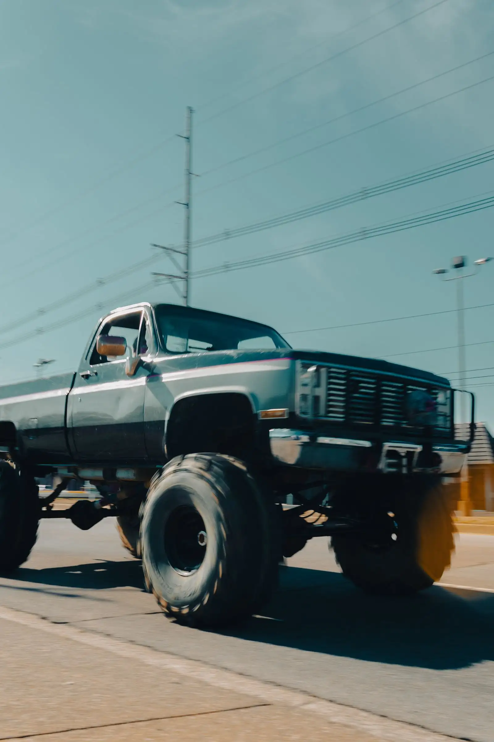 Lifted pickup truck with oversized tires
